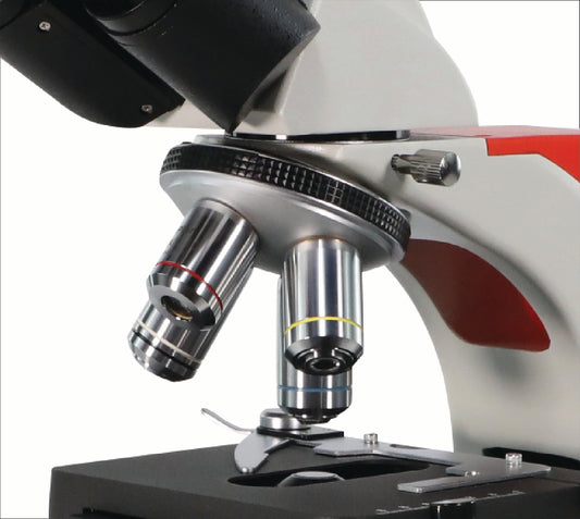 Close-up of Astra microscope nosepiece with 4X, 10X, 40X, and 100X oil achromatic objective lenses.