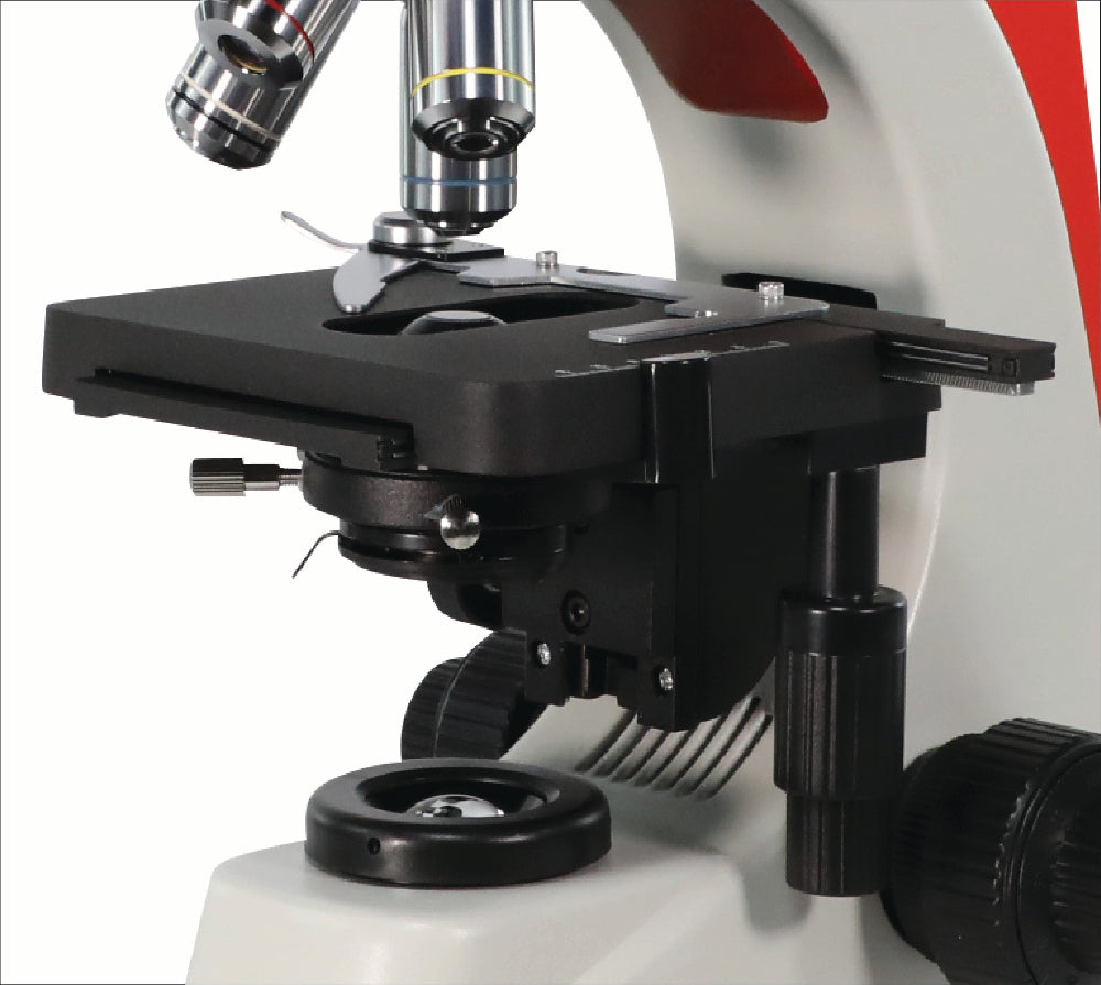 Astra microscope 3D mechanical stage with low-position coaxial coarse and fine focus knobs for smooth adjustment.