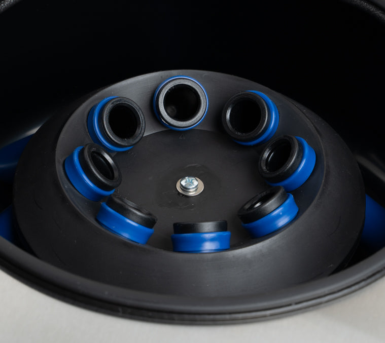 Close-up of 8-place fixed angle rotor in Qor Labs AT Digital centrifuge