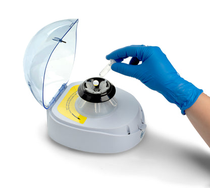 Laboratory technician using Qor Labs 10,000 RPM Mini Centrifuge for sample processing